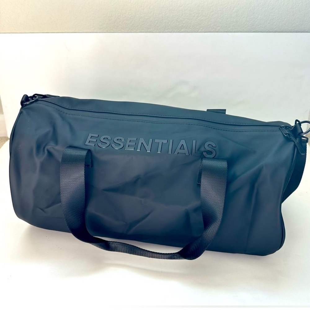 ESSENTIALS Matte Black Duffel with Embossed Logo